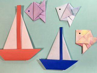 Origami sailboats and fishes in Japan